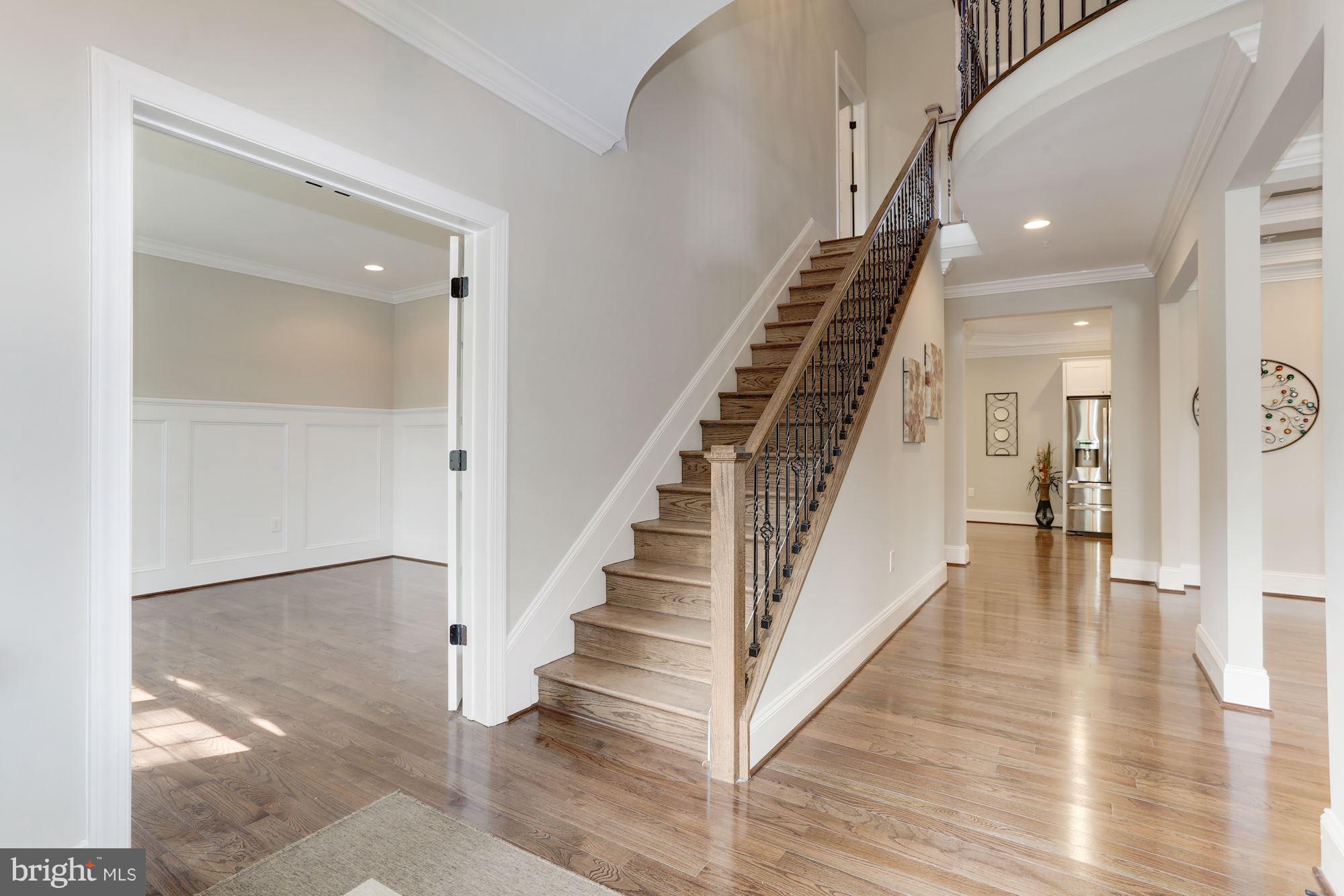 507 South Rolling Road Baltimore, MD 21228 - Photo 3 of 30 a view of an entryway with wooden floor