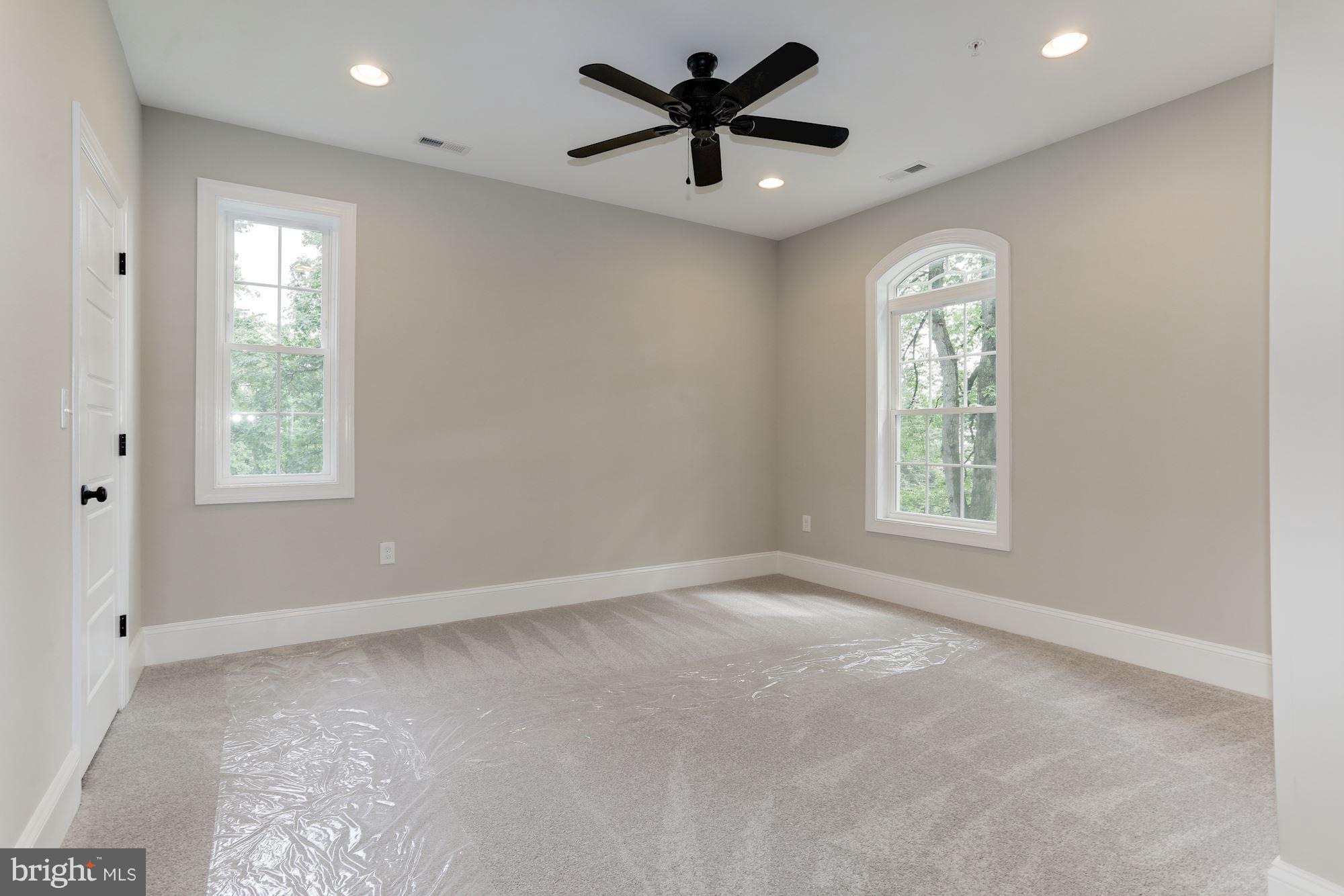 507 South Rolling Road Baltimore, MD 21228 - Photo 23 of 30 a view of a livingroom with a ceiling fan and window