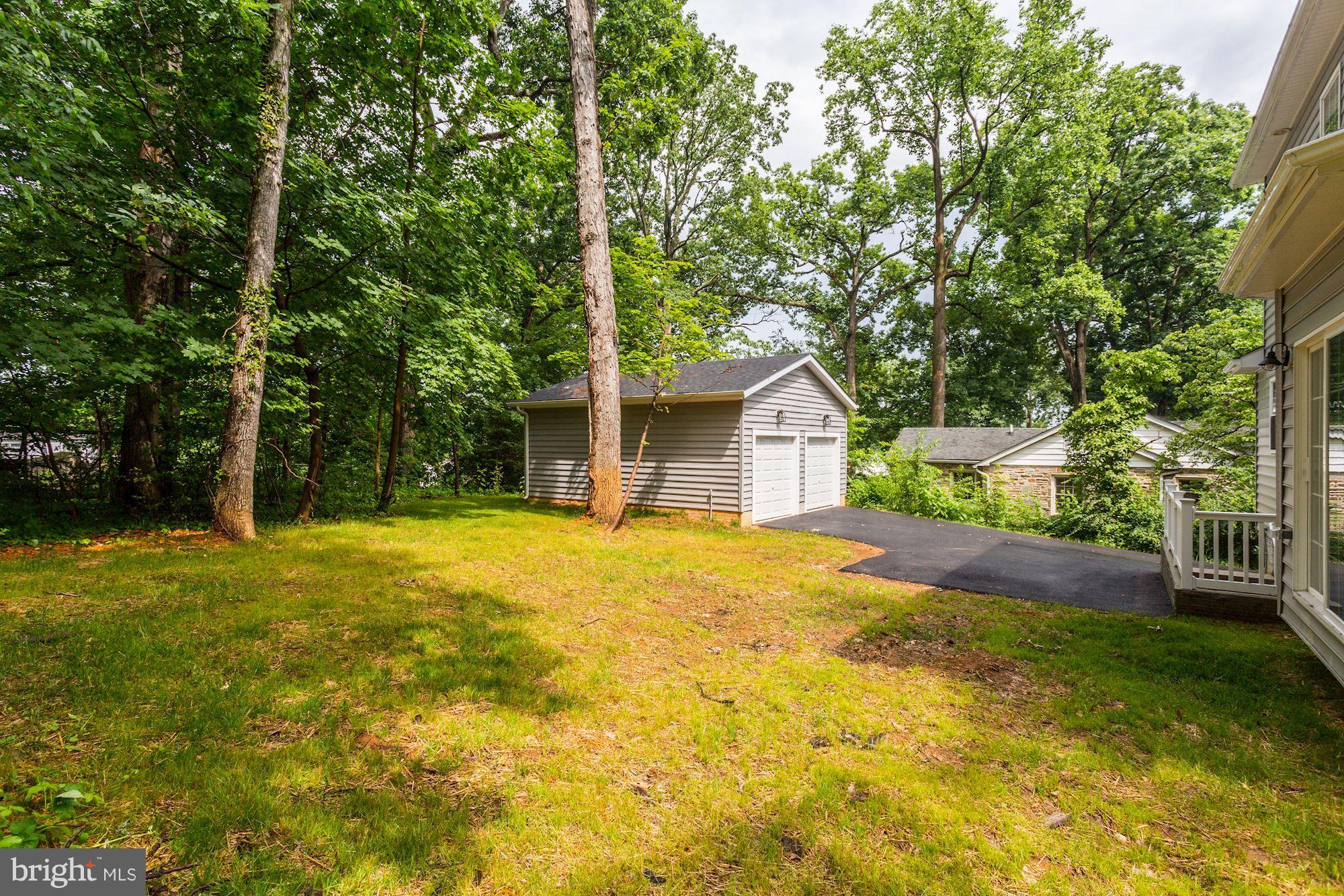 507 South Rolling Road Baltimore, MD 21228 - Photo 29 of 30 a front view of house with yard and green space