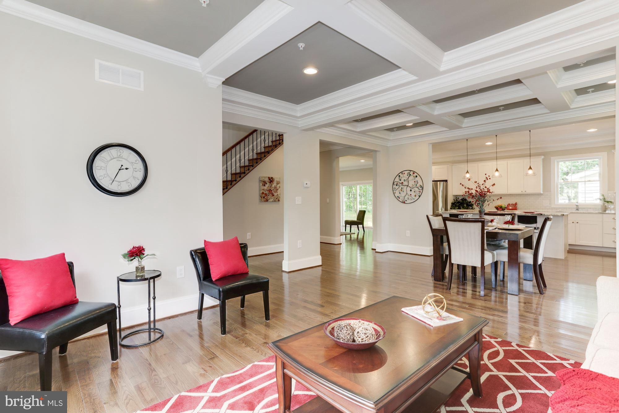 507 South Rolling Road Baltimore, MD 21228 - Photo 6 of 30 a living room with furniture and wooden floor