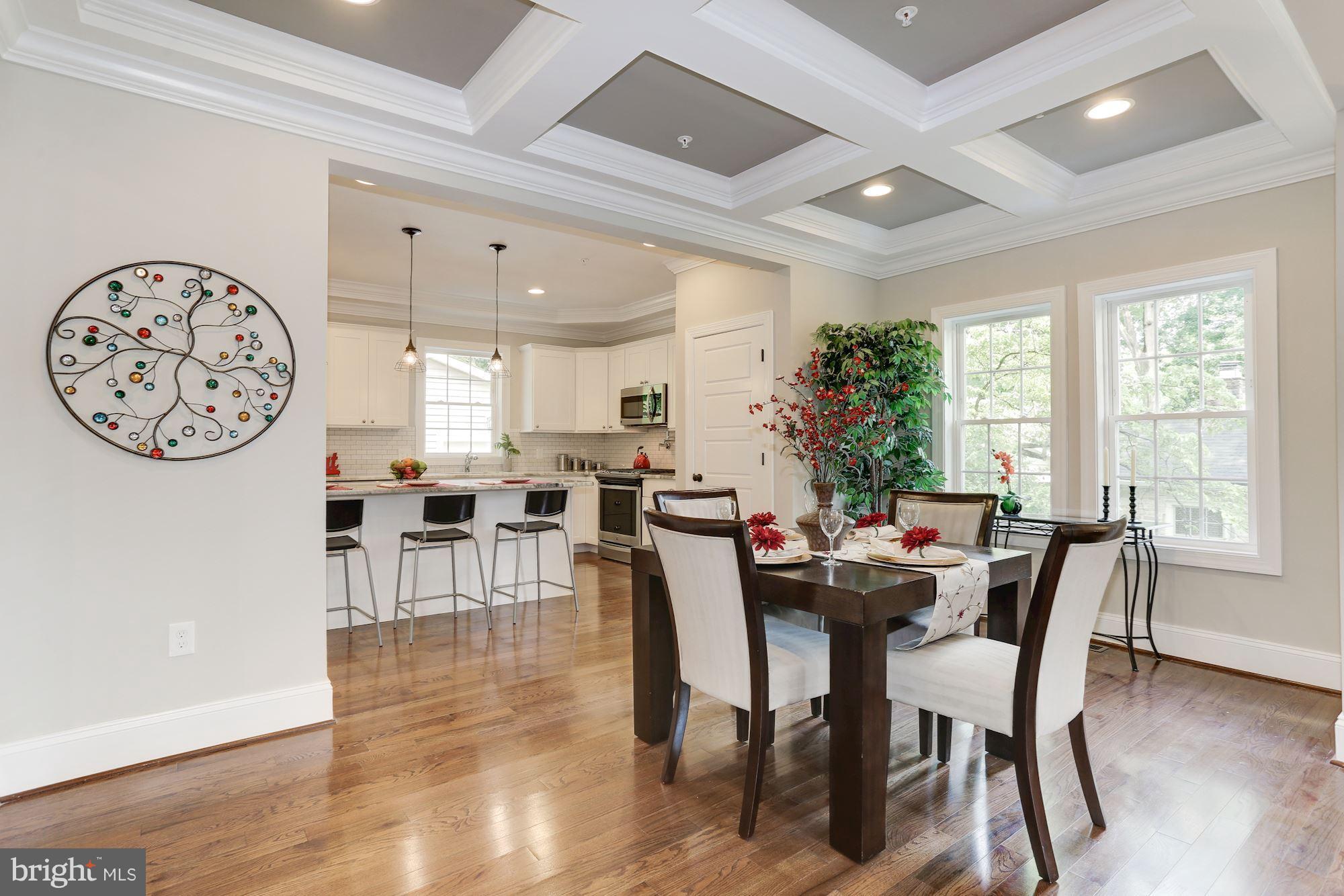 507 South Rolling Road Baltimore, MD 21228 - Photo 7 of 30 a view of a dining room with furniture window and wooden floor