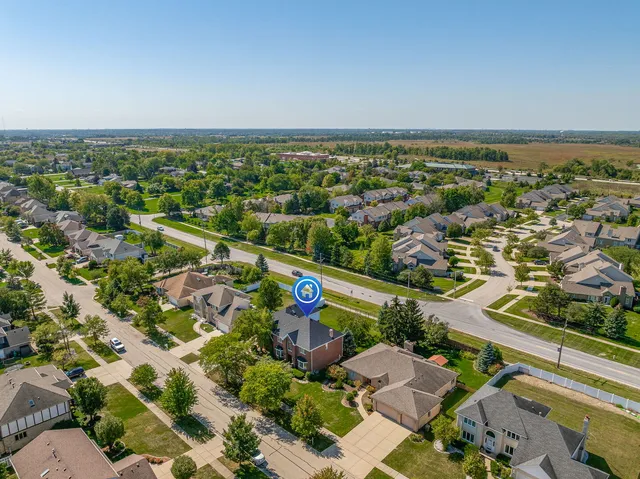 an aerial view of a city with lots of residential buildings