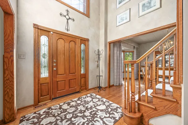 a view of an entryway with a door