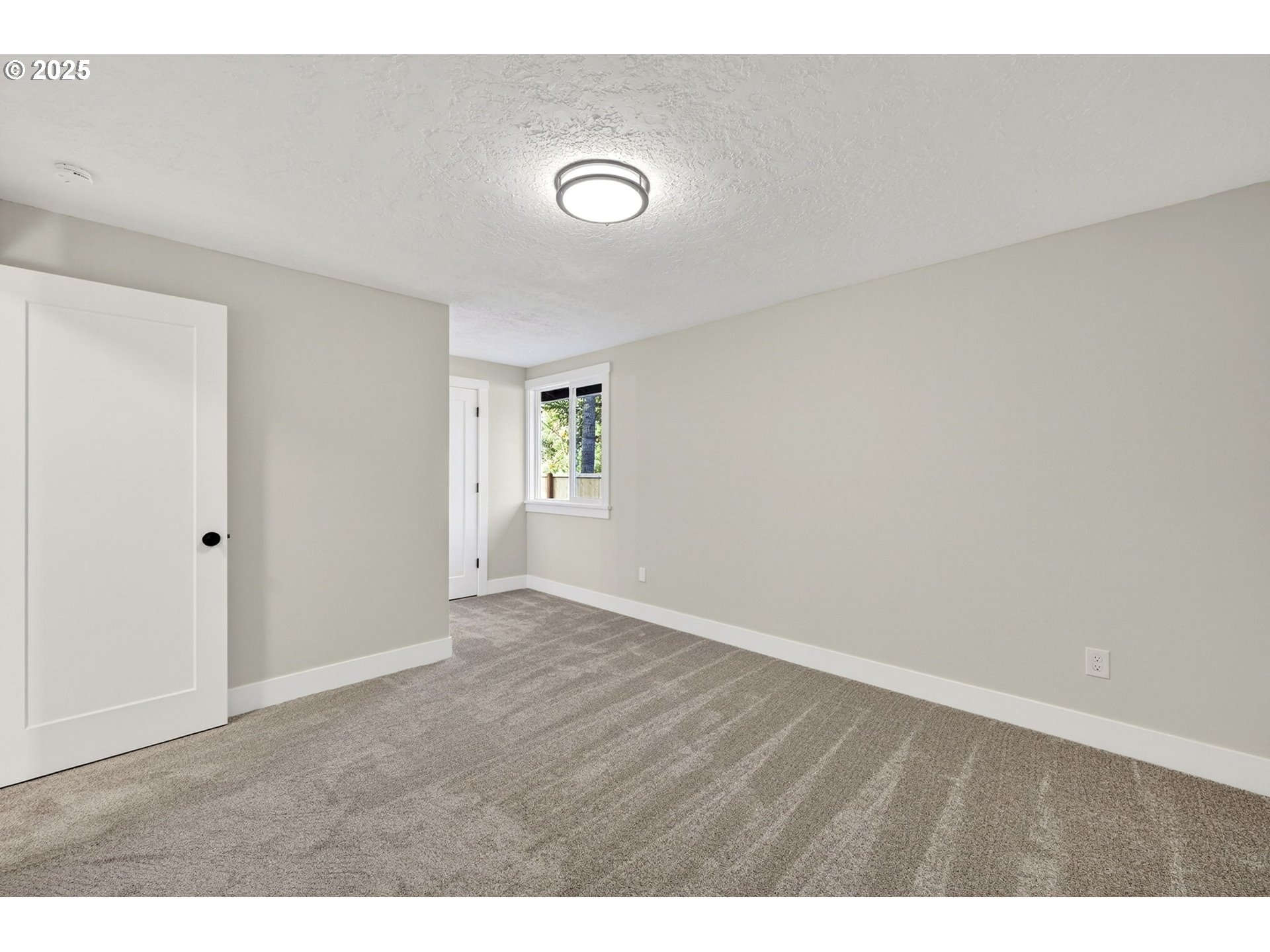 17745 Davis Drive Sandy, OR 97055 - Photo 18 of 44 a view of an empty room with a window