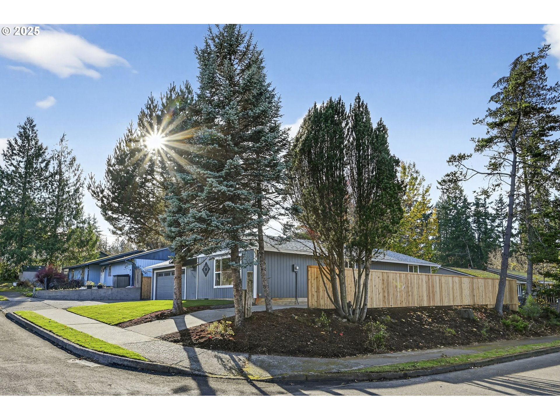 17745 Davis Drive Sandy, OR 97055 - Photo 2 of 44 a view of a yard in front of a house with large tree