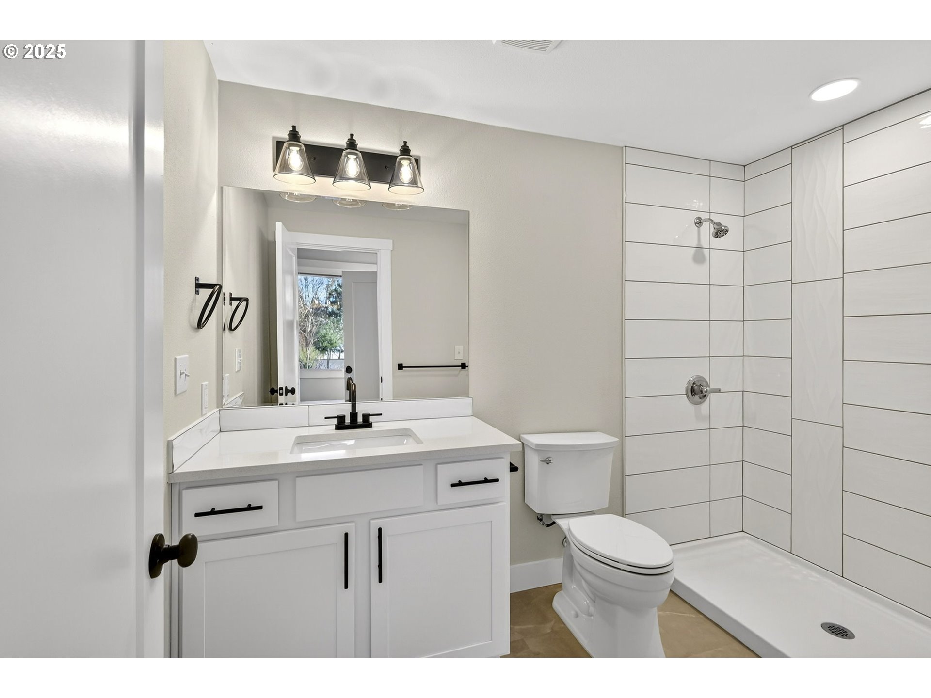 17745 Davis Drive Sandy, OR 97055 - Photo 21 of 44 a bathroom with a sink a toilet and mirror