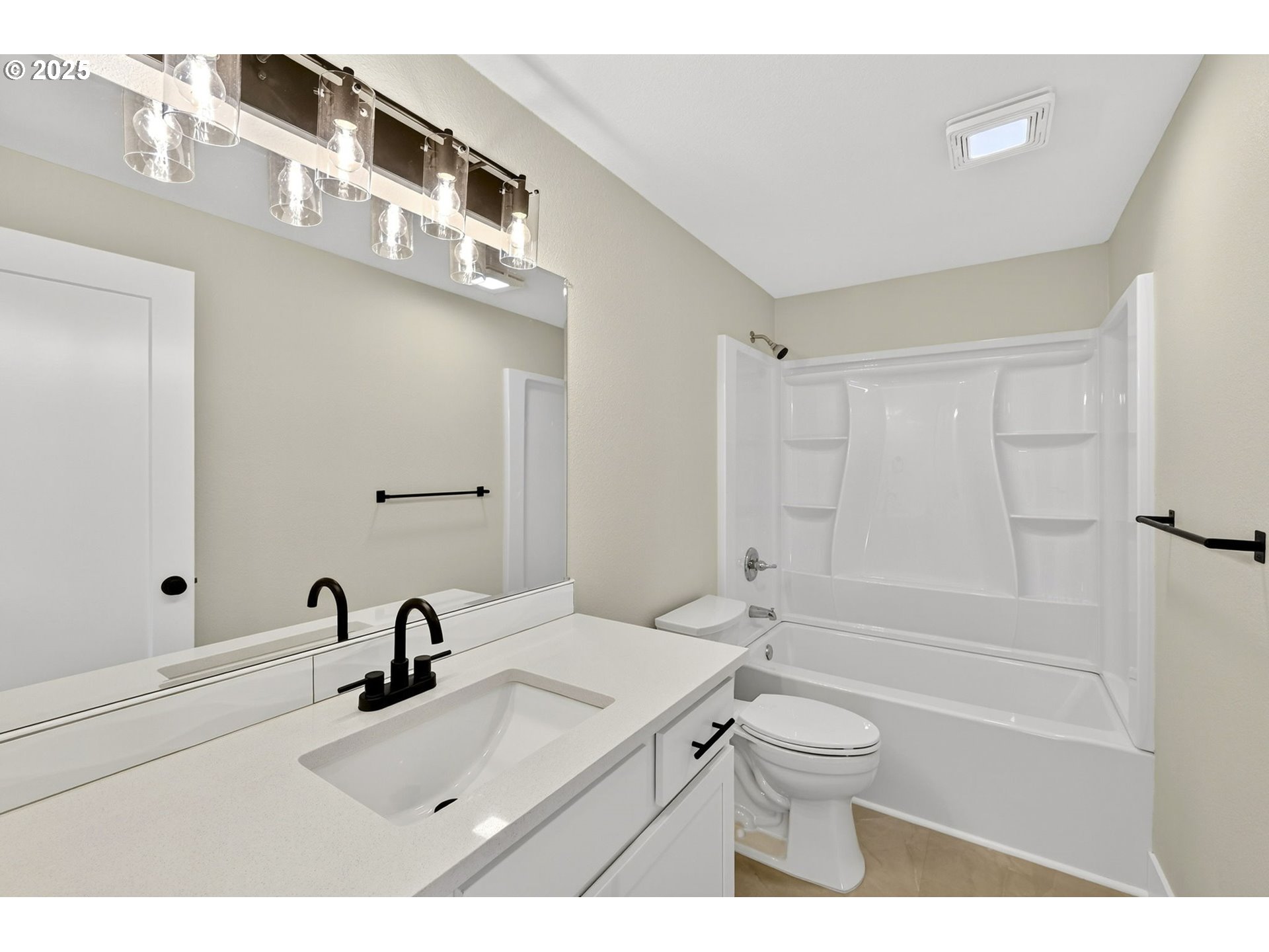 17745 Davis Drive Sandy, OR 97055 - Photo 28 of 44 a bathroom with a sink a toilet and a tub