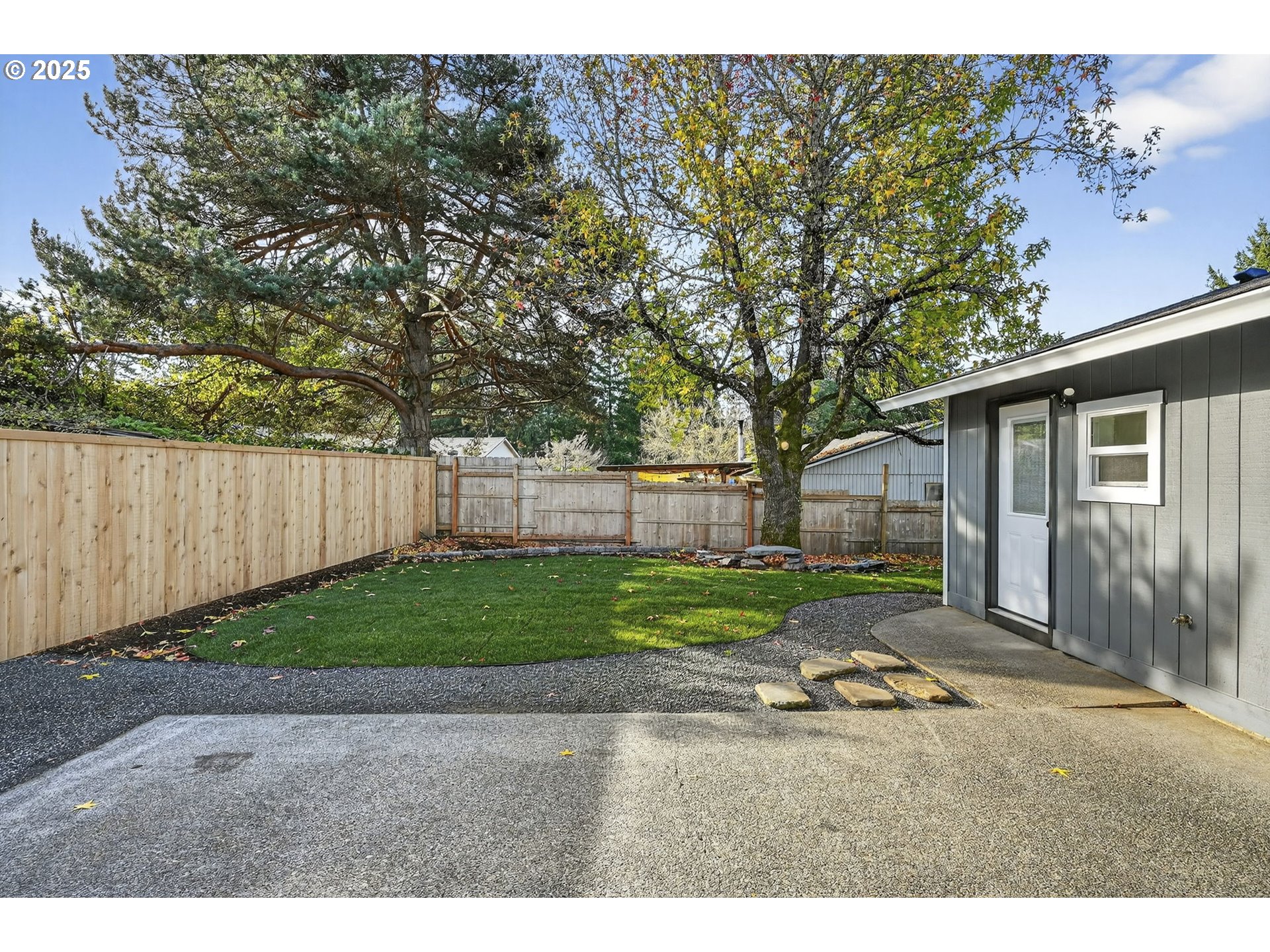 17745 Davis Drive Sandy, OR 97055 - Photo 33 of 44 a backyard of a house with lots of green space