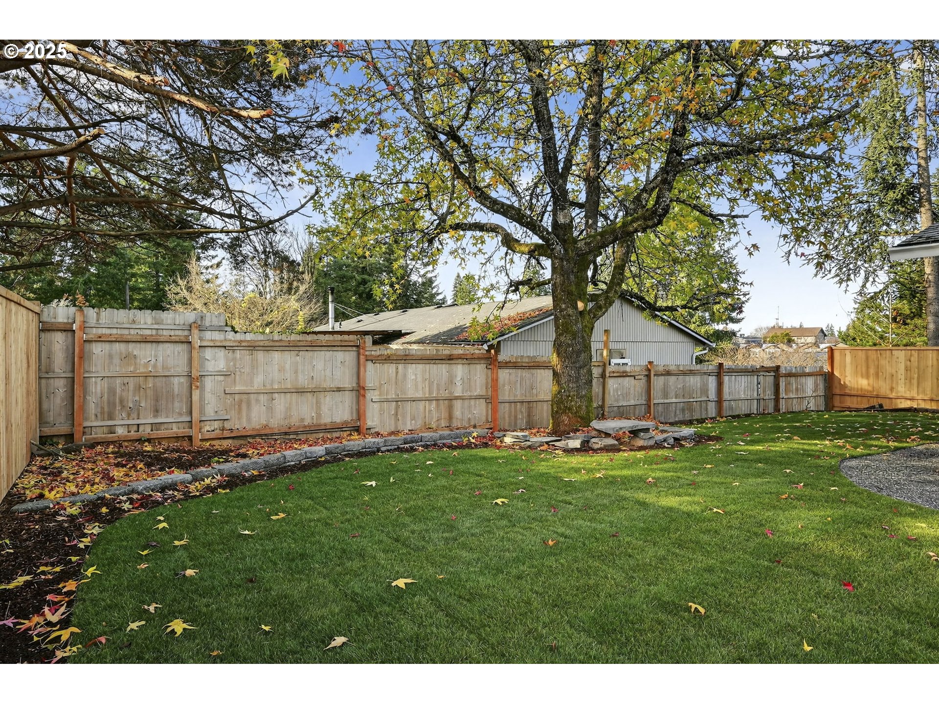 17745 Davis Drive Sandy, OR 97055 - Photo 35 of 44 a backyard of a house with lots of green space
