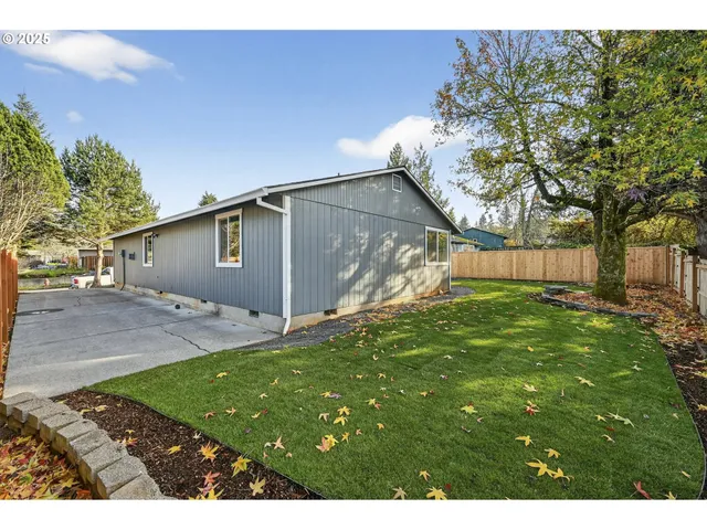 a view of backyard with green space