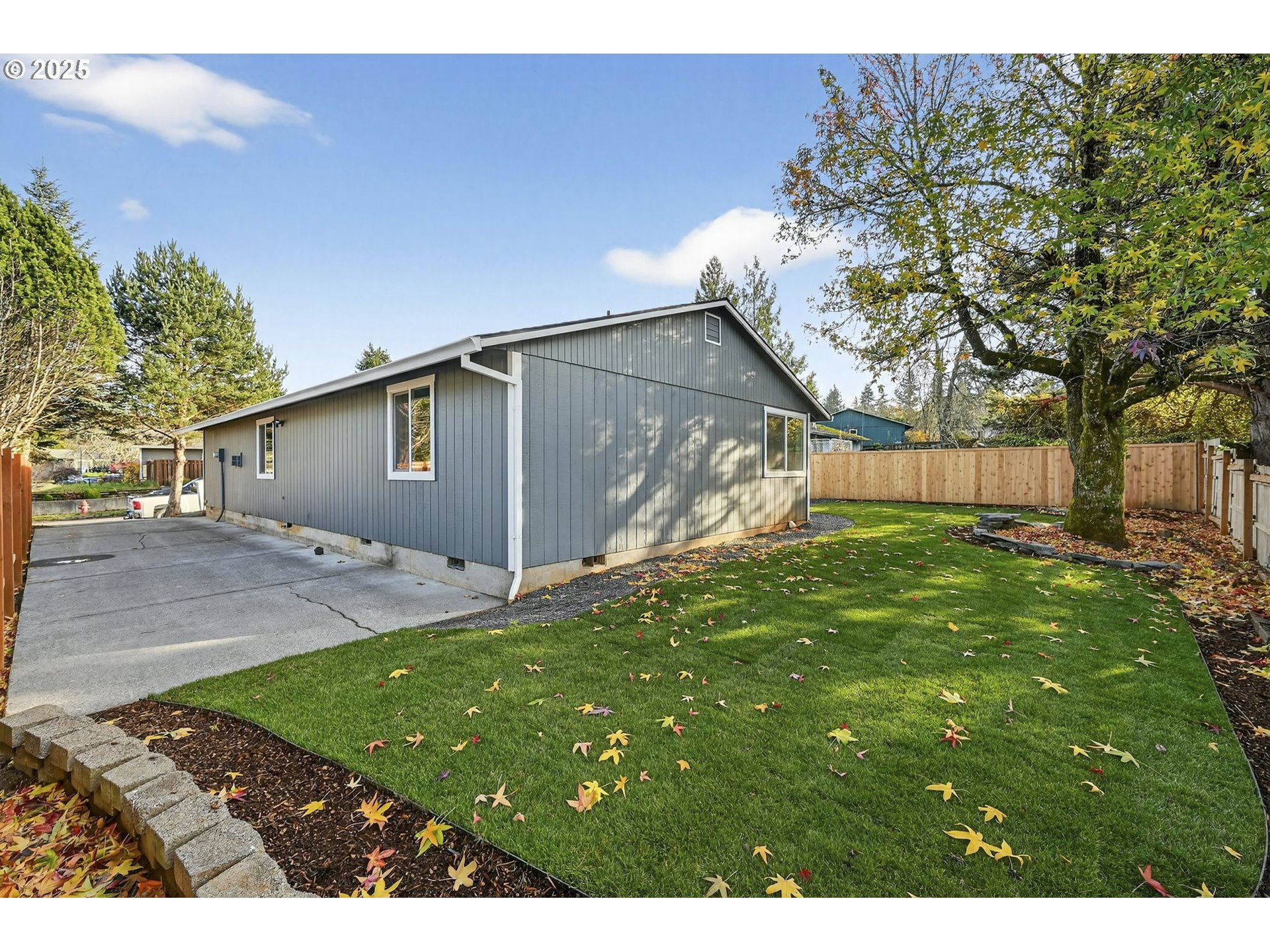 17745 Davis Drive Sandy, OR 97055 - Photo 40 of 44 a backyard of a house with lots of green space