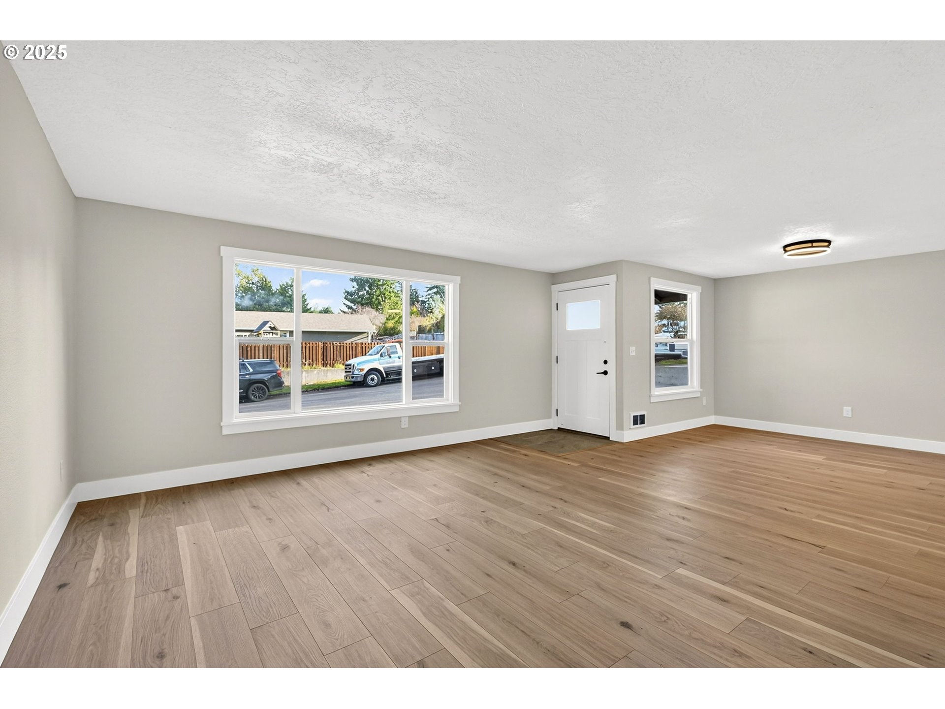 17745 Davis Drive Sandy, OR 97055 - Photo 7 of 44 wooden floor in an empty room with a window