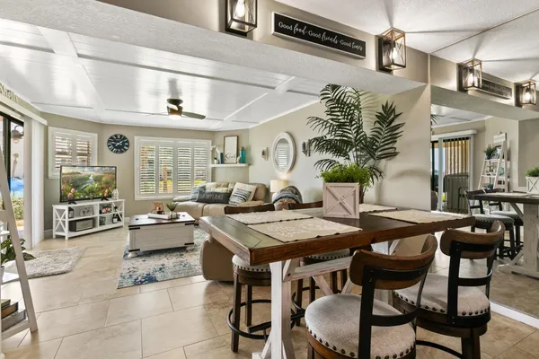 a view of an outside dining space with furniture