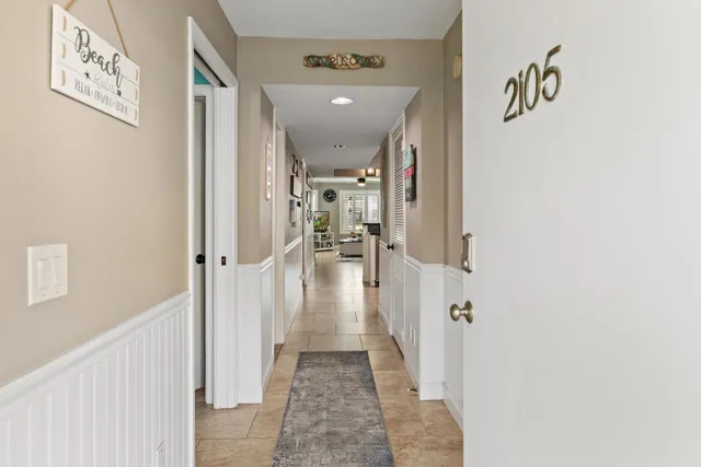 a kitchen with stainless steel appliances granite countertop a refrigerator sink and stove