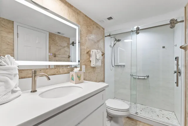 an aerial view of residential building with parking space