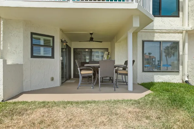 a front view of a house with a garage