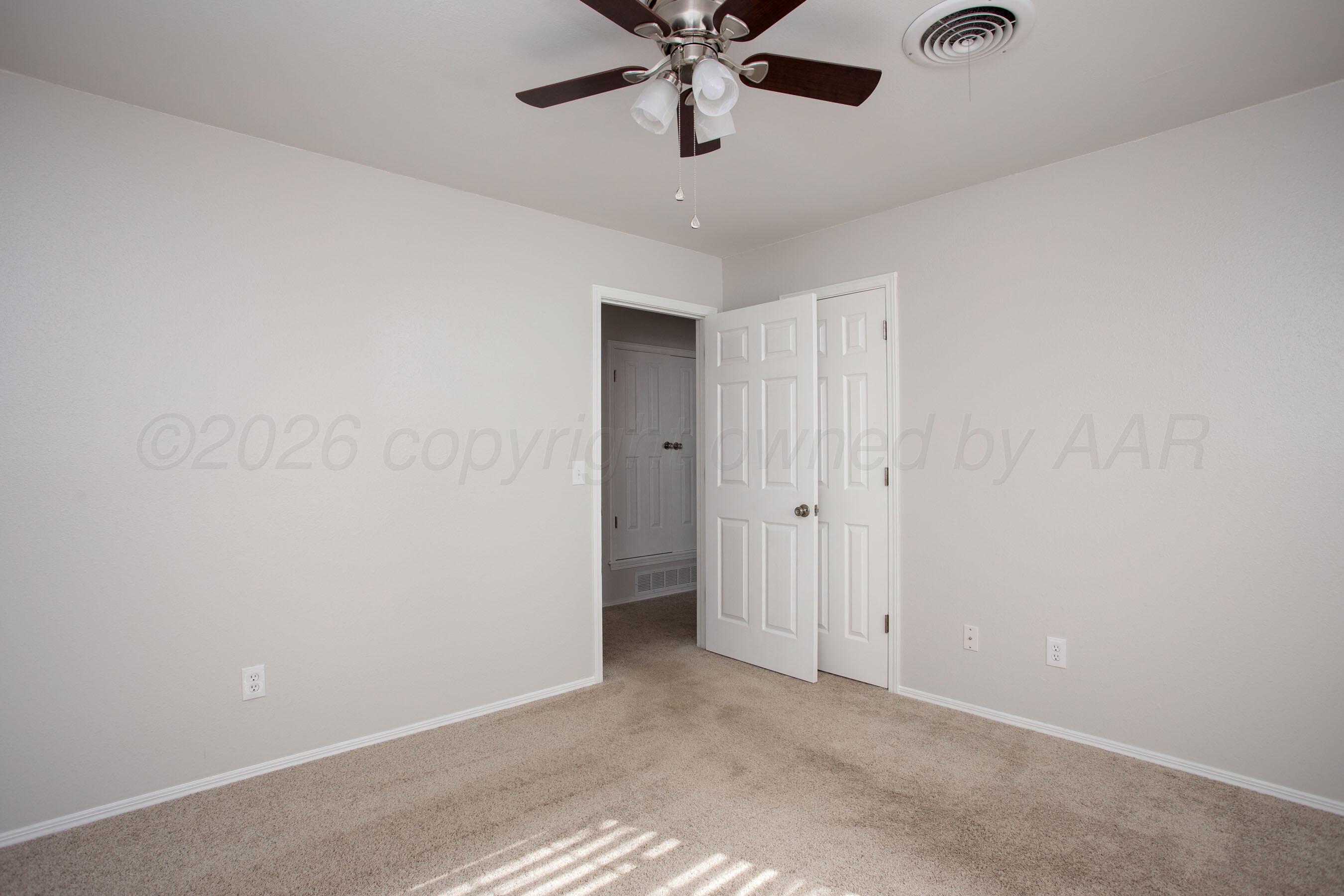 7924 Simpson Drive Amarillo, TX 79121 - Photo 19 of 33 a view of an empty room