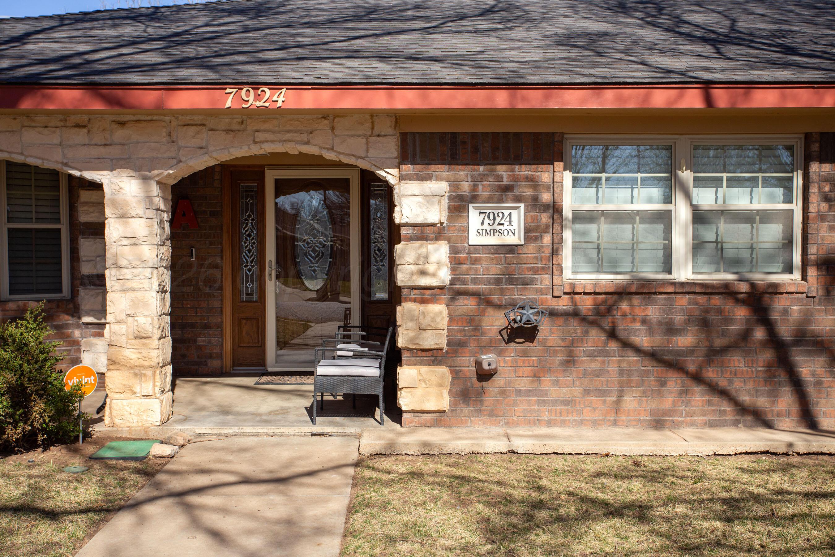7924 Simpson Drive Amarillo, TX 79121 - Photo 2 of 33 a view of building with wooden floor and a window