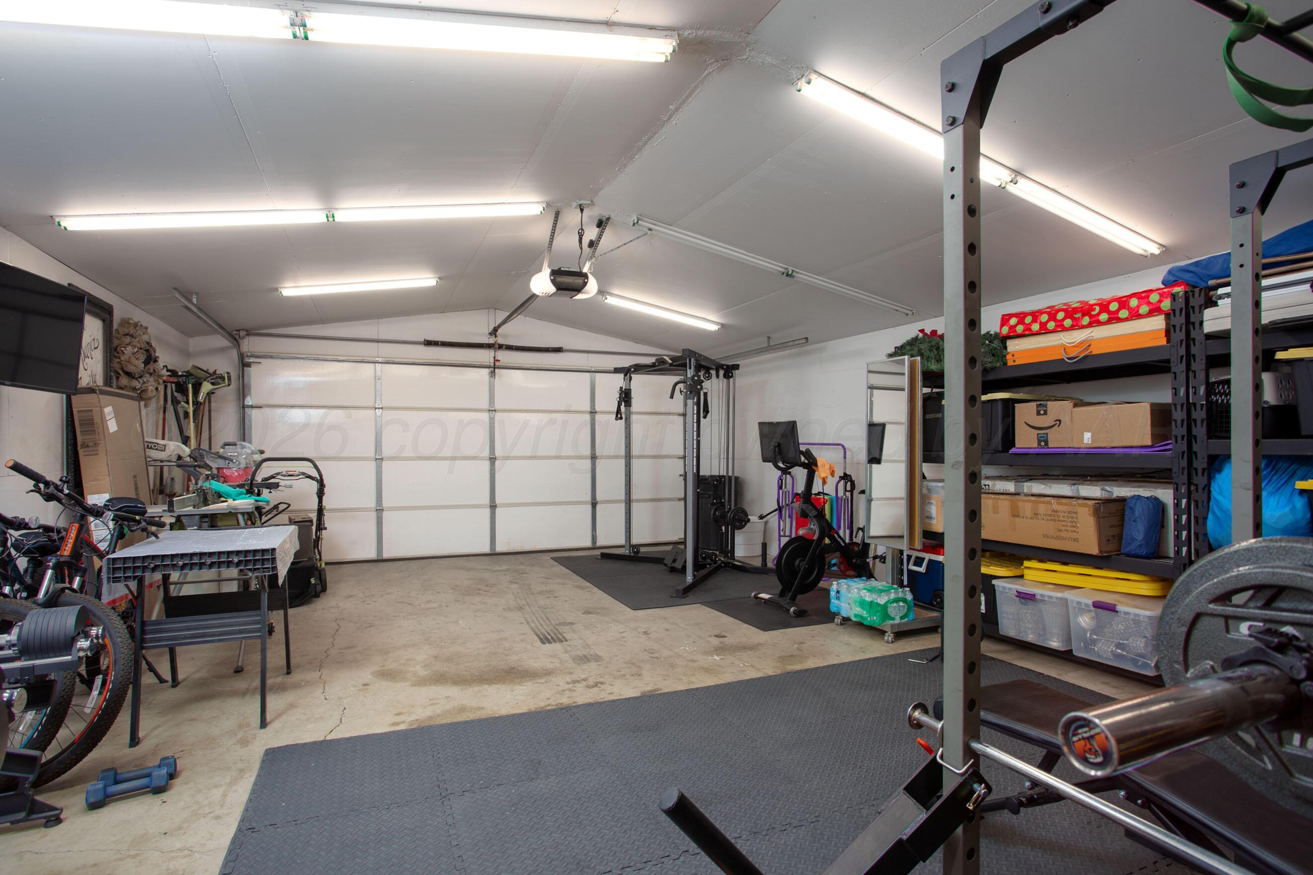 7924 Simpson Drive Amarillo, TX 79121 - Photo 26 of 33 a view of a room with gym equipment