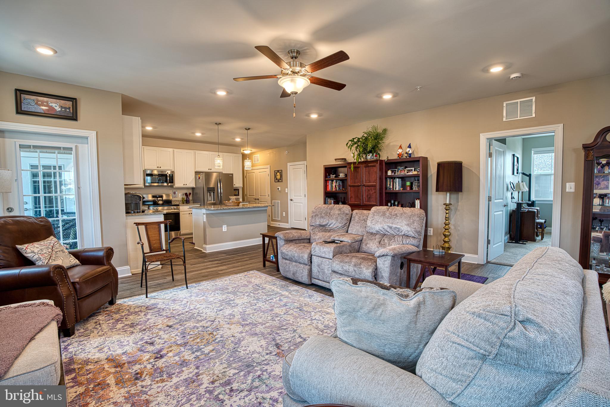 406 Bold Ruler Court, Unit 402 Havre de Grace, MD 21078 - Photo 12 of 43 Spacious living area with modern charm.
