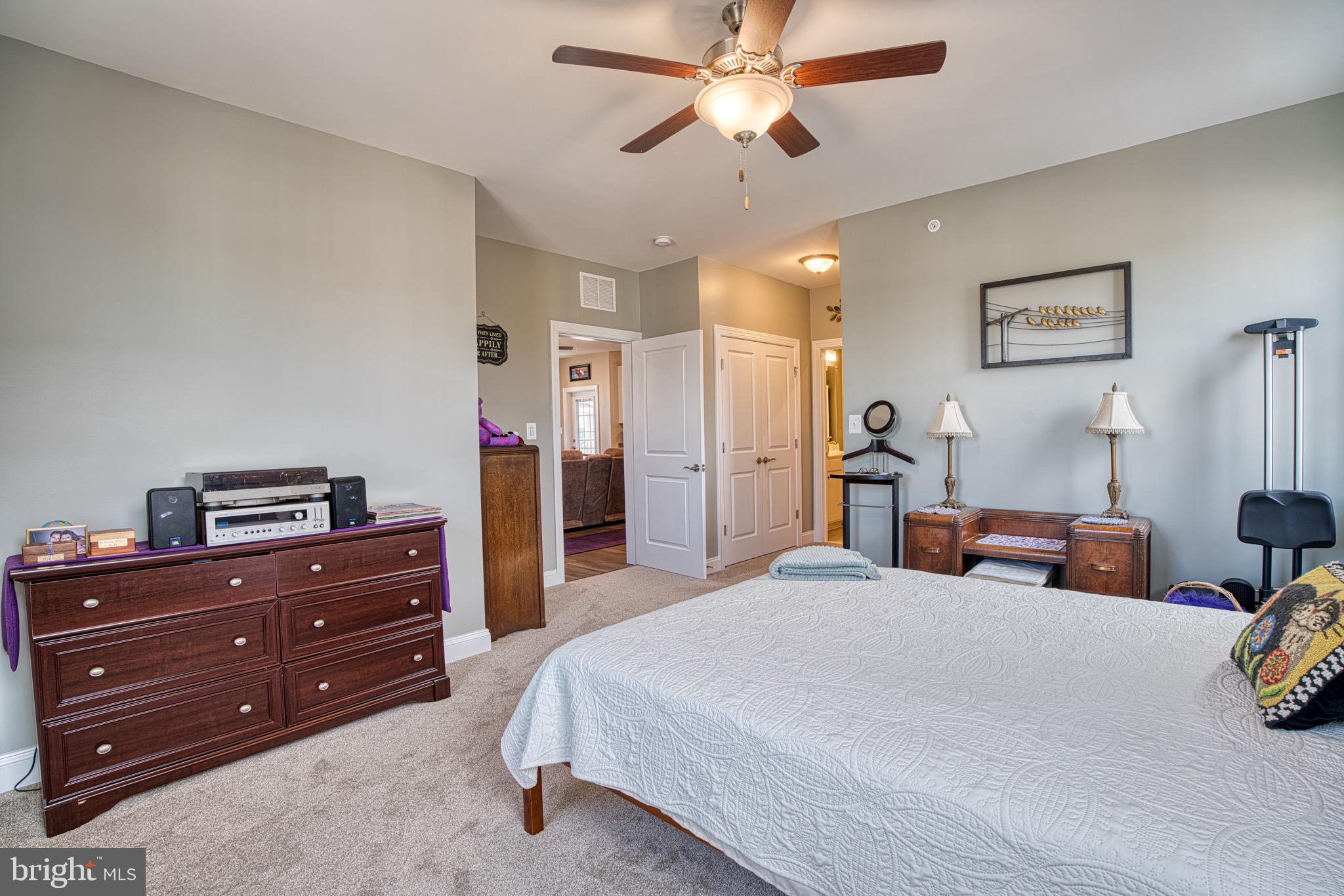 406 Bold Ruler Court, Unit 402 Havre de Grace, MD 21078 - Photo 20 of 43 Spacious bedroom with serene ambiance.