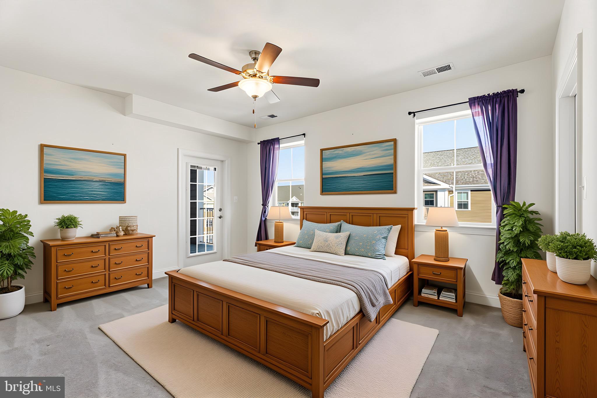 406 Bold Ruler Court, Unit 402 Havre de Grace, MD 21078 - Photo 2 of 49 a spacious bedroom with a large bed and a chandelier