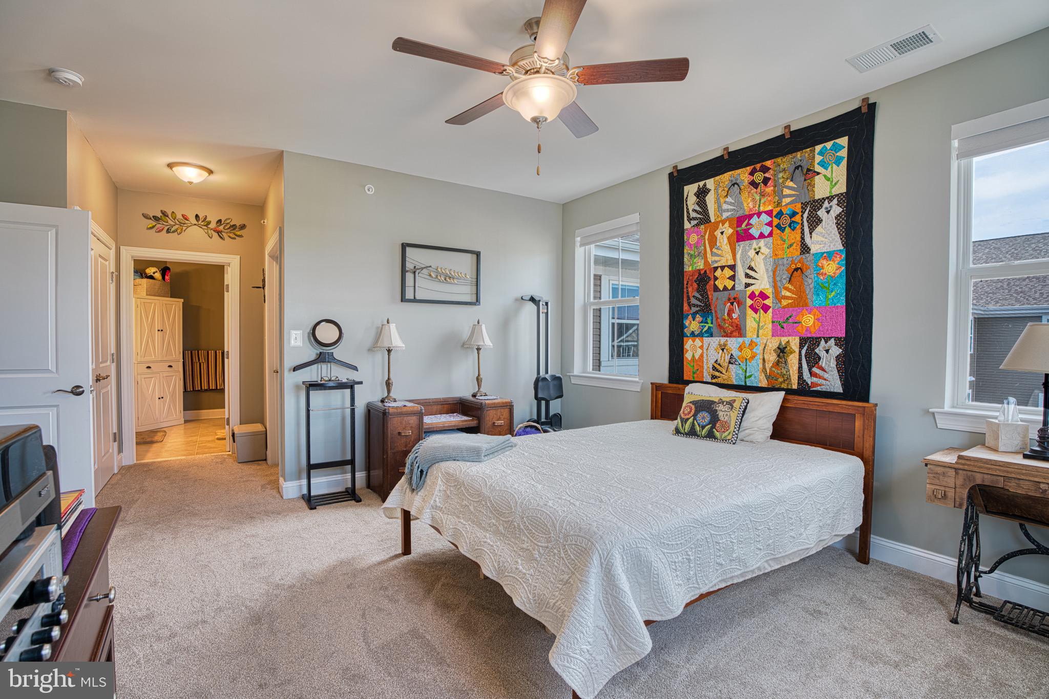 406 Bold Ruler Court, Unit 402 Havre de Grace, MD 21078 - Photo 21 of 43 Bright and inviting bedroom with artistic flair.