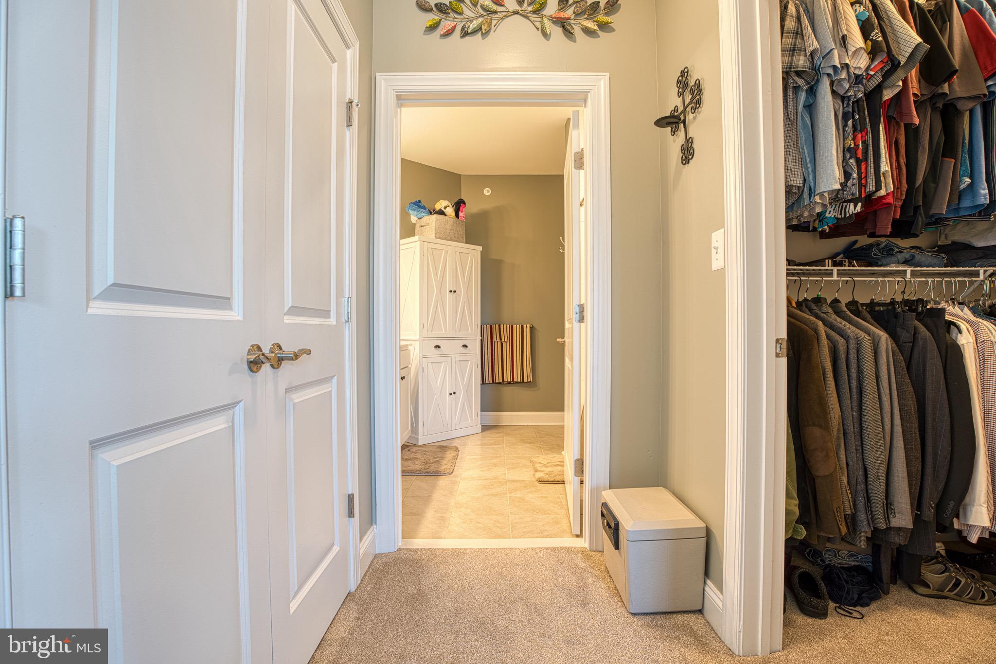 406 Bold Ruler Court, Unit 402 Havre de Grace, MD 21078 - Photo 22 of 43 Inviting hallway leading to serene spaces.