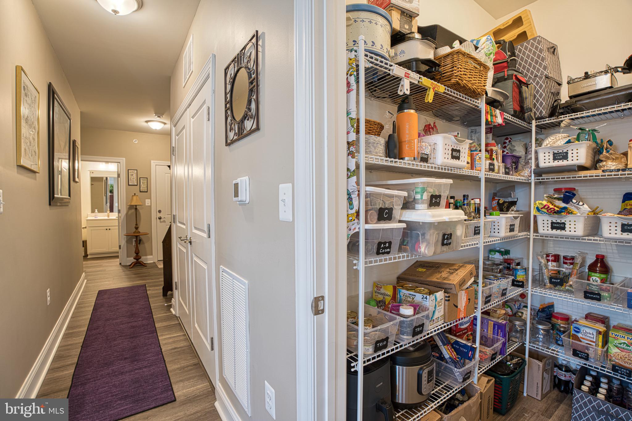 406 Bold Ruler Court, Unit 402 Havre de Grace, MD 21078 - Photo 25 of 43 Spacious hallway with organized pantry.