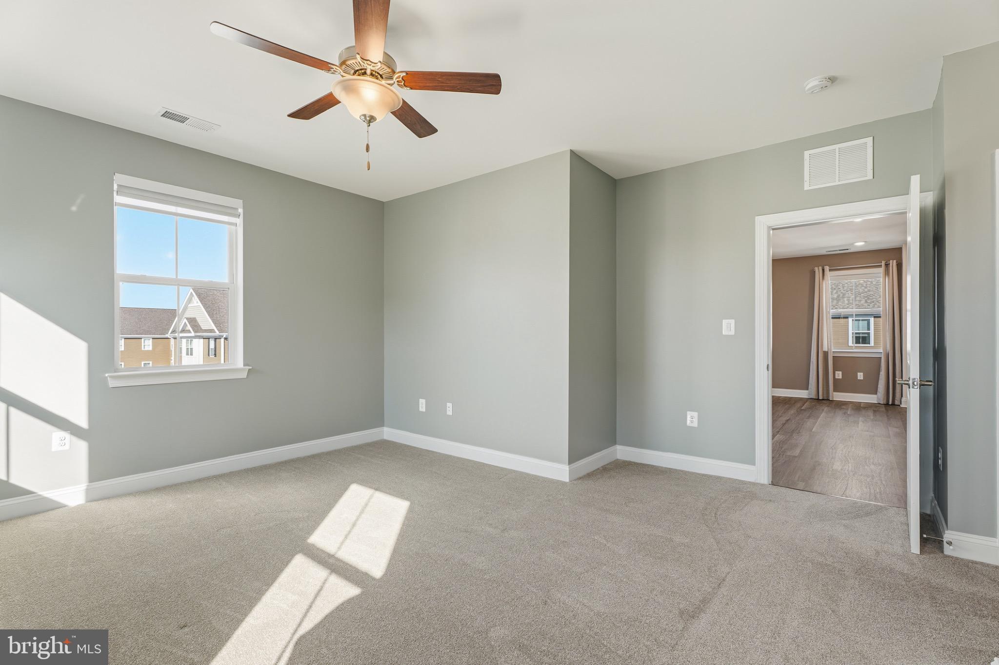 406 Bold Ruler Court, Unit 402 Havre de Grace, MD 21078 - Photo 26 of 49 a view of empty room with window and ceiling fan