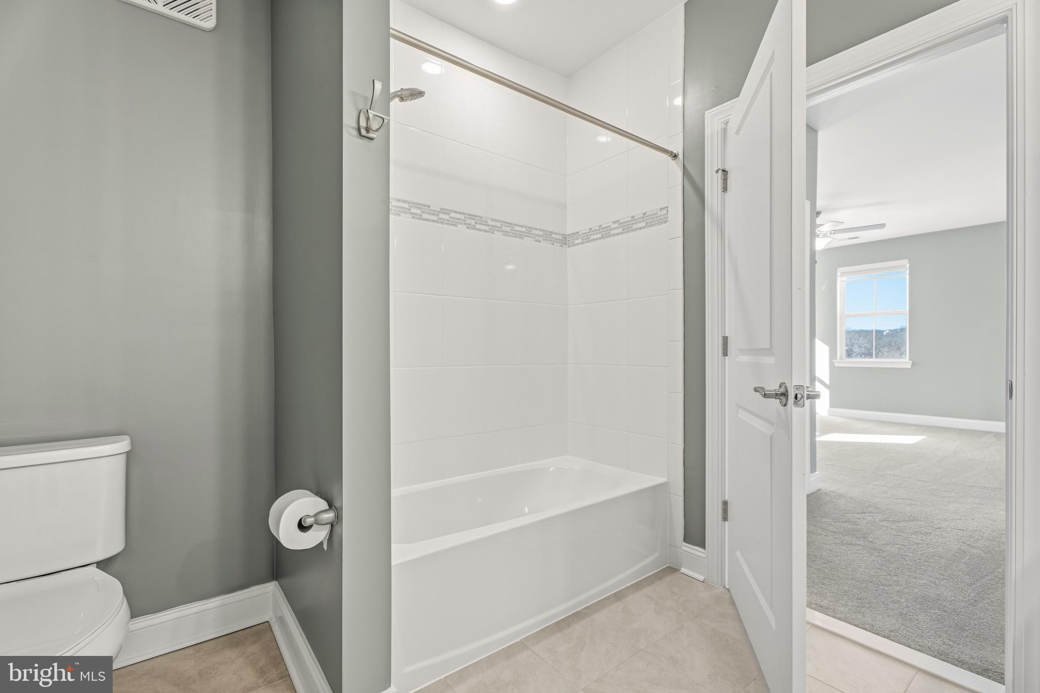 406 Bold Ruler Court, Unit 402 Havre de Grace, MD 21078 - Photo 29 of 49 a bathroom with a bathtub and a shower