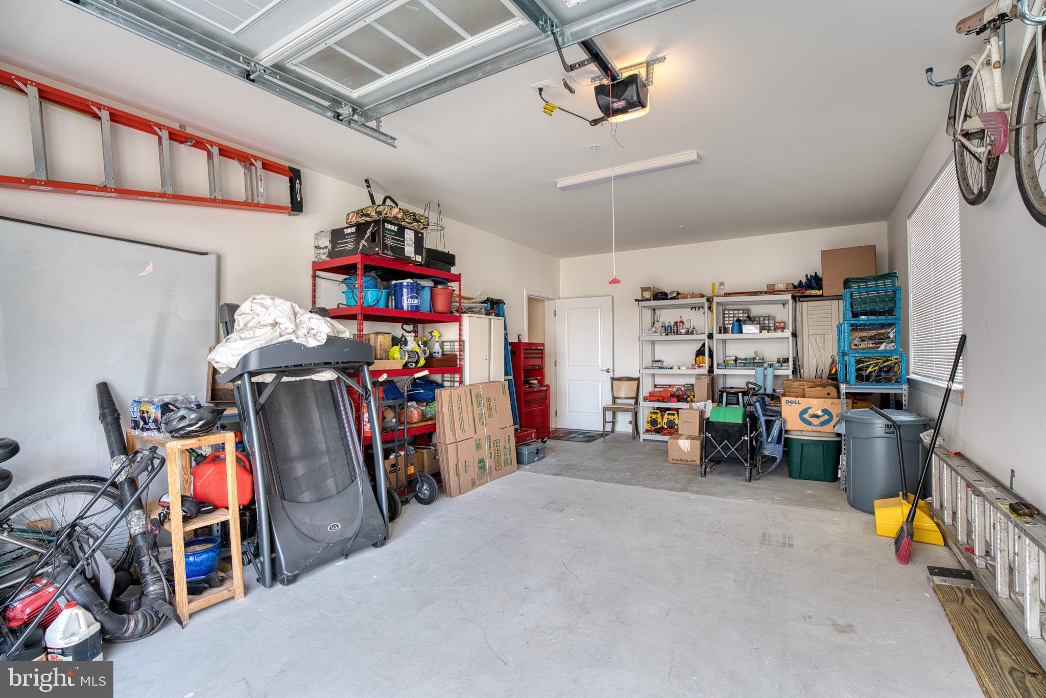 406 Bold Ruler Court, Unit 402 Havre de Grace, MD 21078 - Photo 33 of 43 Spacious garage with organized chaos.