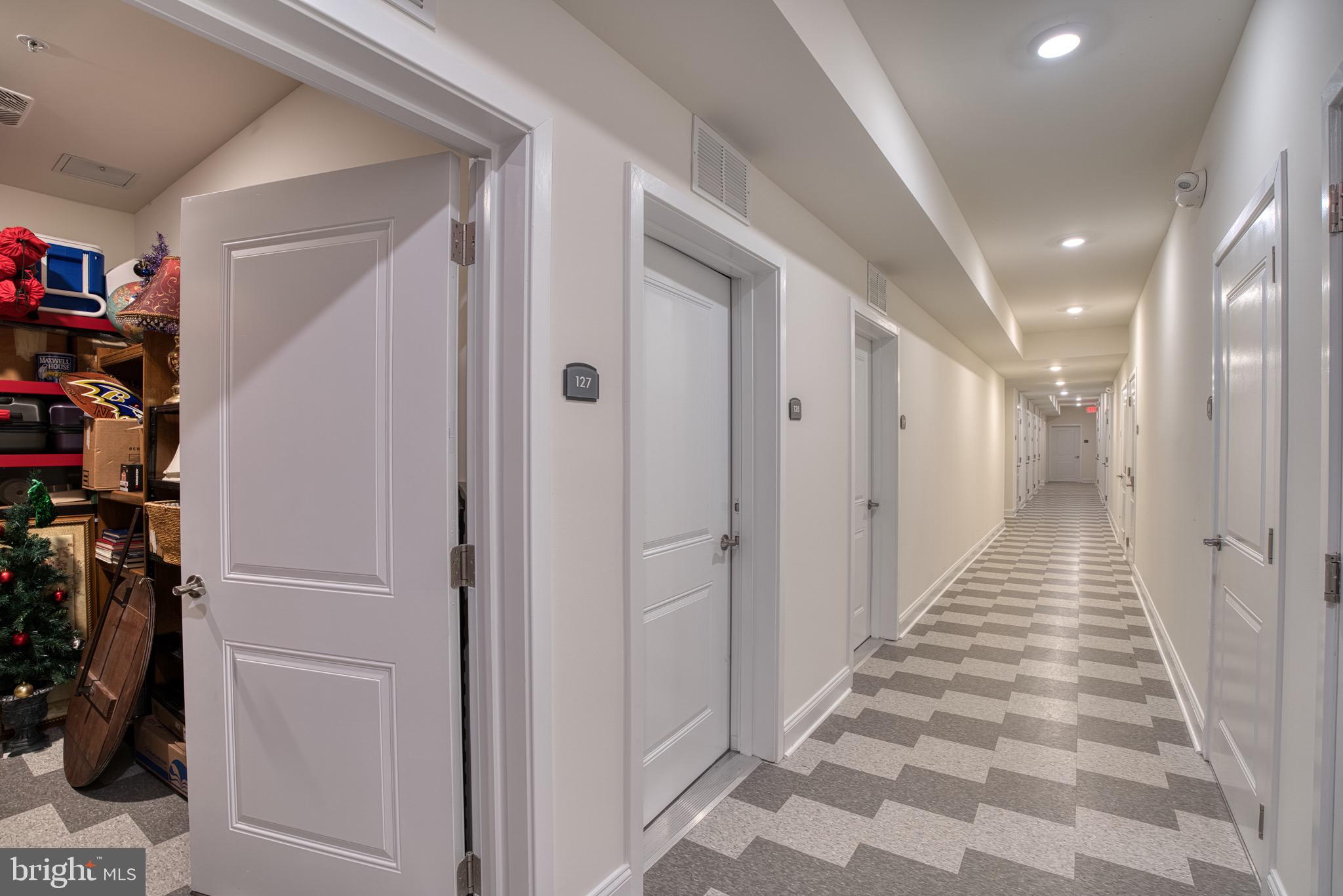 406 Bold Ruler Court, Unit 402 Havre de Grace, MD 21078 - Photo 36 of 43 Modern corridor with stylish tile design.