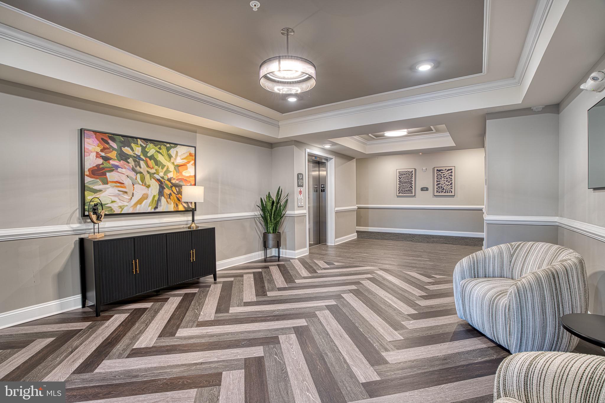 406 Bold Ruler Court, Unit 402 Havre de Grace, MD 21078 - Photo 4 of 43 Elegant lobby with modern design elements.
