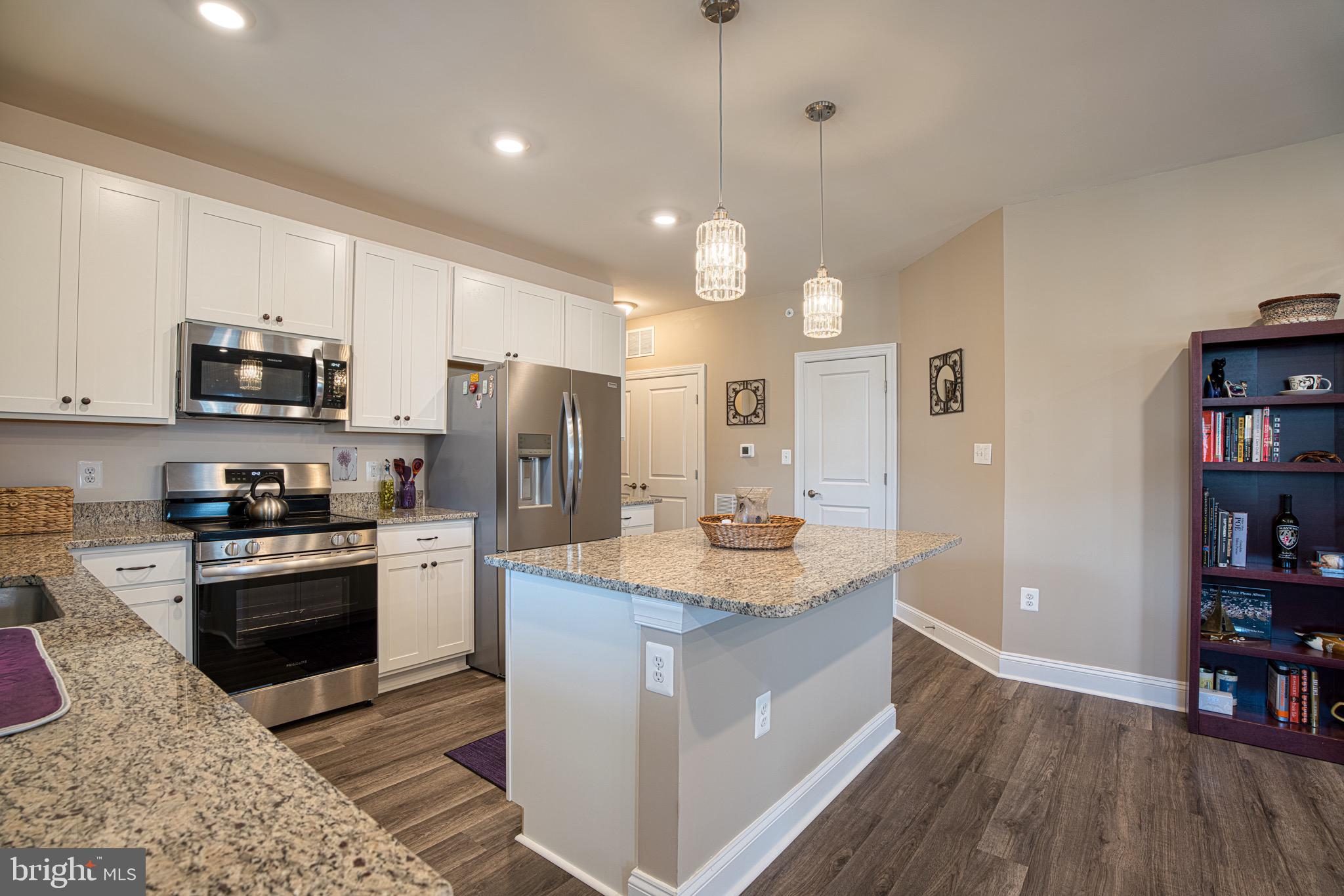 406 Bold Ruler Court, Unit 402 Havre de Grace, MD 21078 - Photo 9 of 43 Modern kitchen with sleek finishes.
