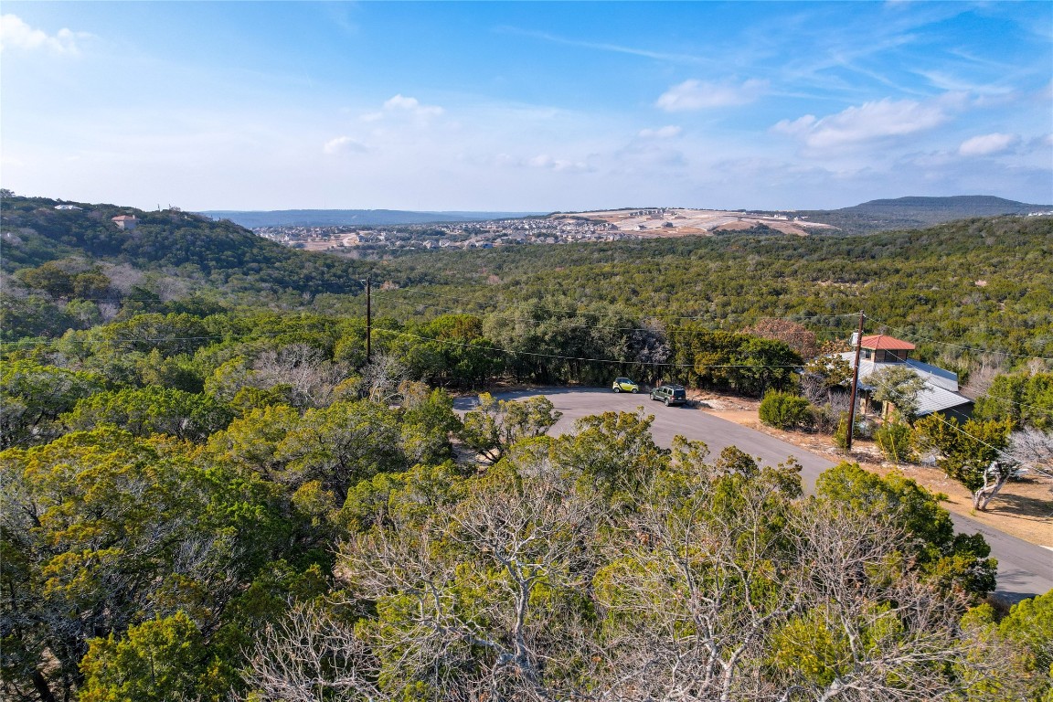 8010 Flintlock Circle Lago Vista, TX 78645 - Photo 15 of 15 a view of a city with mountains in the background