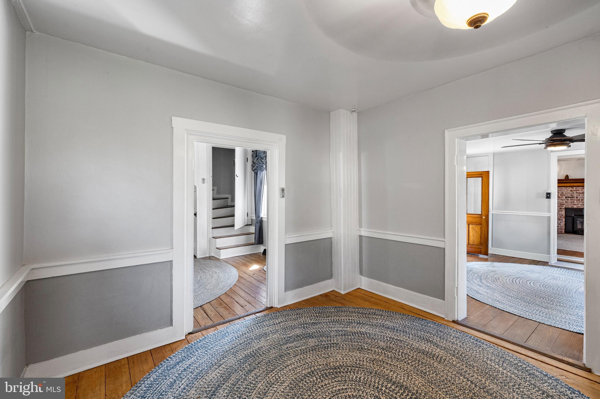 989 Swover Creek Road Edinburg, VA 22824 - Photo 25 of 132 a view of empty room with wooden floor