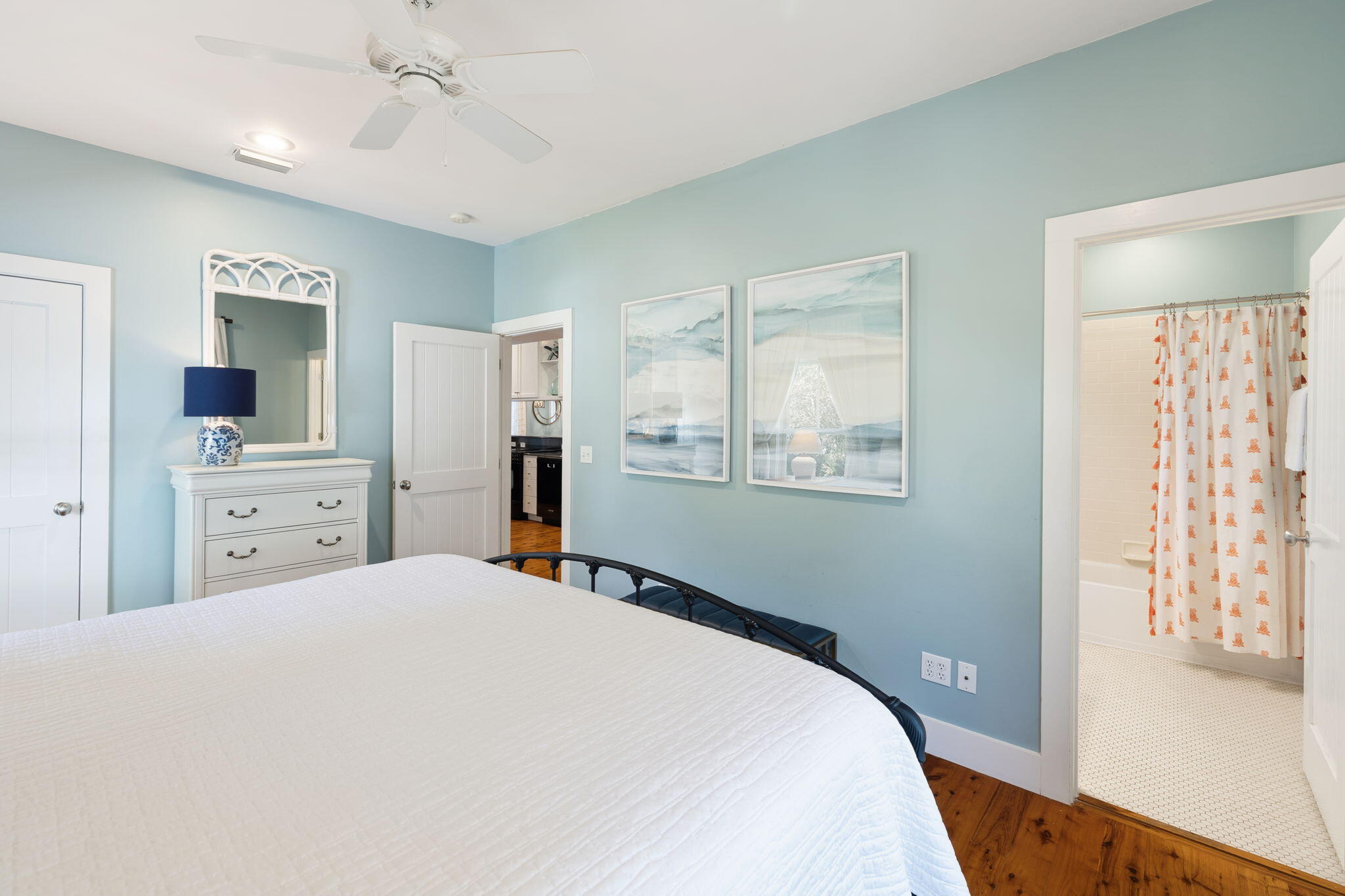 18 Kareny Lane Inlet Beach, FL 32461 - Photo 21 of 48 a bedroom with a large bed and a chandelier
