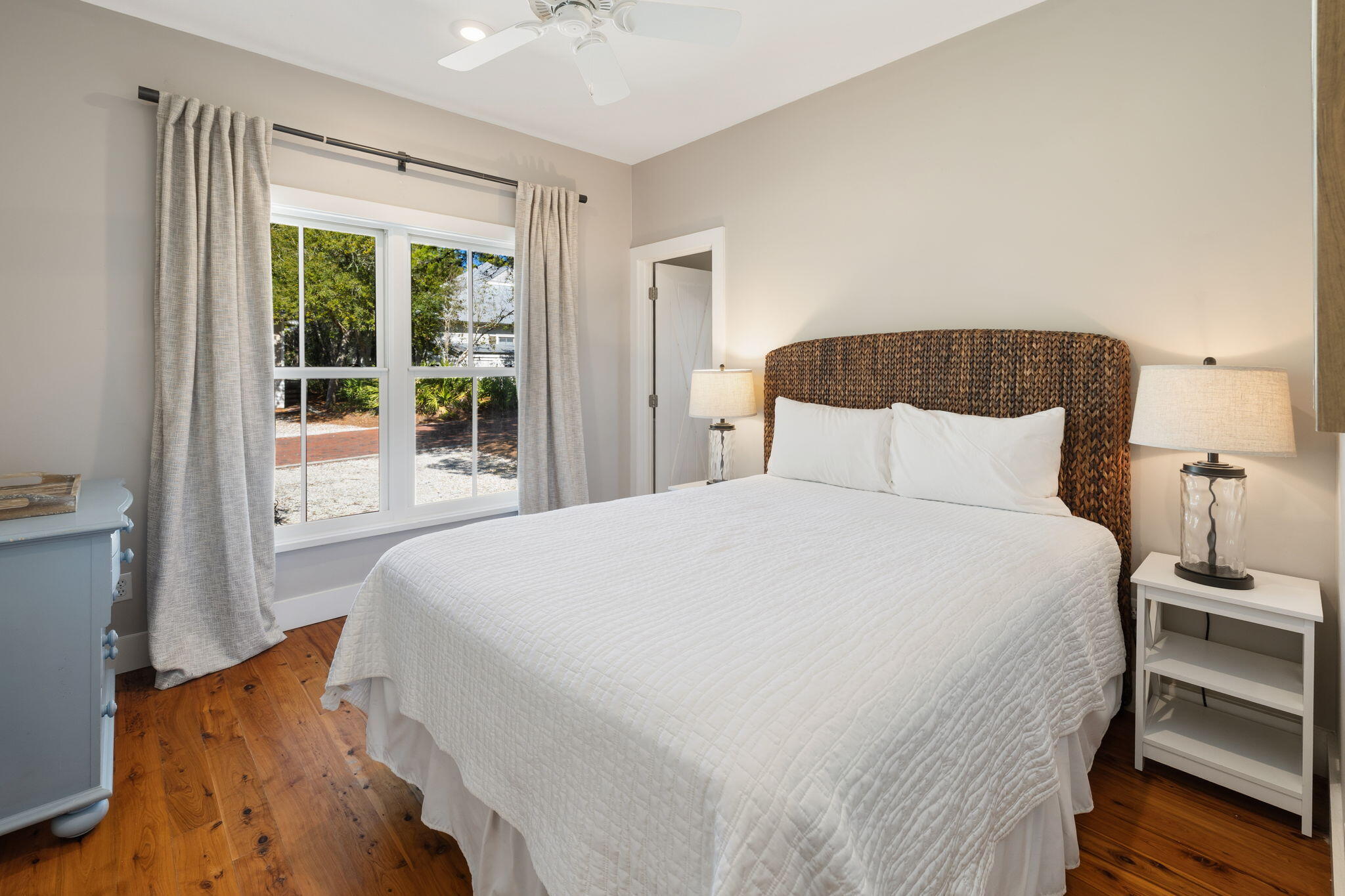 18 Kareny Lane Inlet Beach, FL 32461 - Photo 23 of 48 a bedroom with a bed and wooden floor