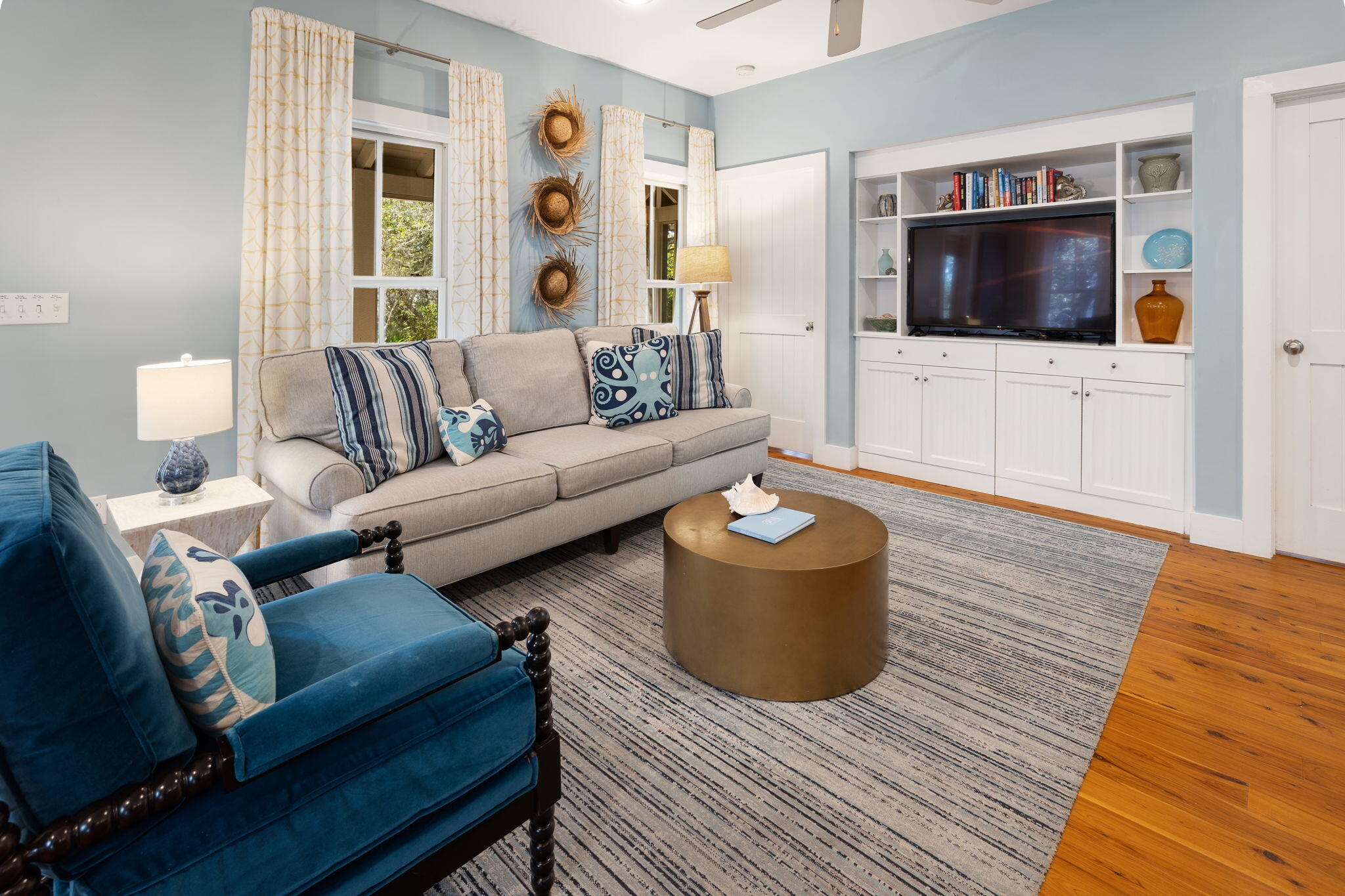 18 Kareny Lane Inlet Beach, FL 32461 - Photo 30 of 48 a living room with furniture and a flat screen tv