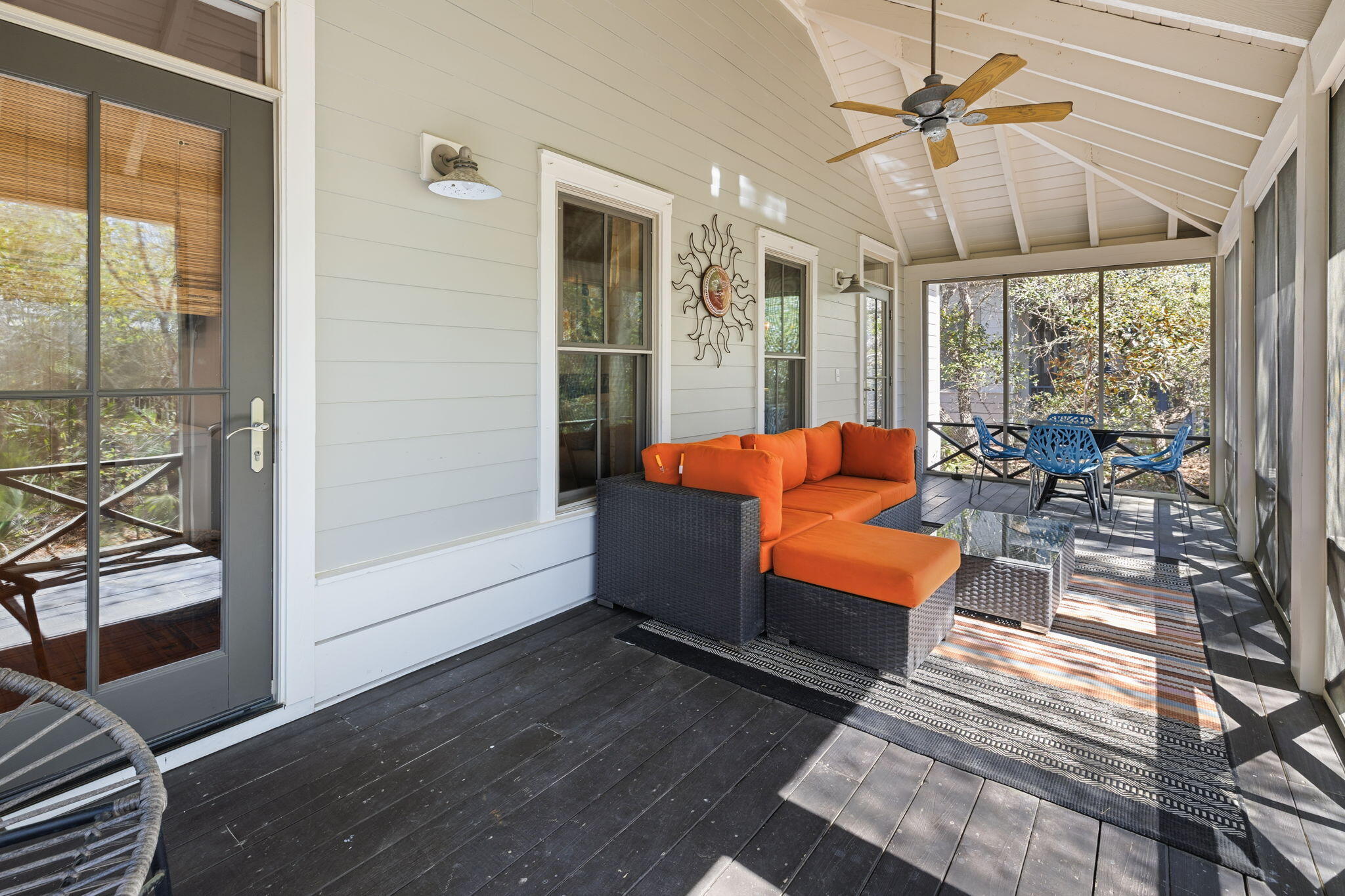 18 Kareny Lane Inlet Beach, FL 32461 - Photo 34 of 48 a living room with furniture a ceiling fan and a large window