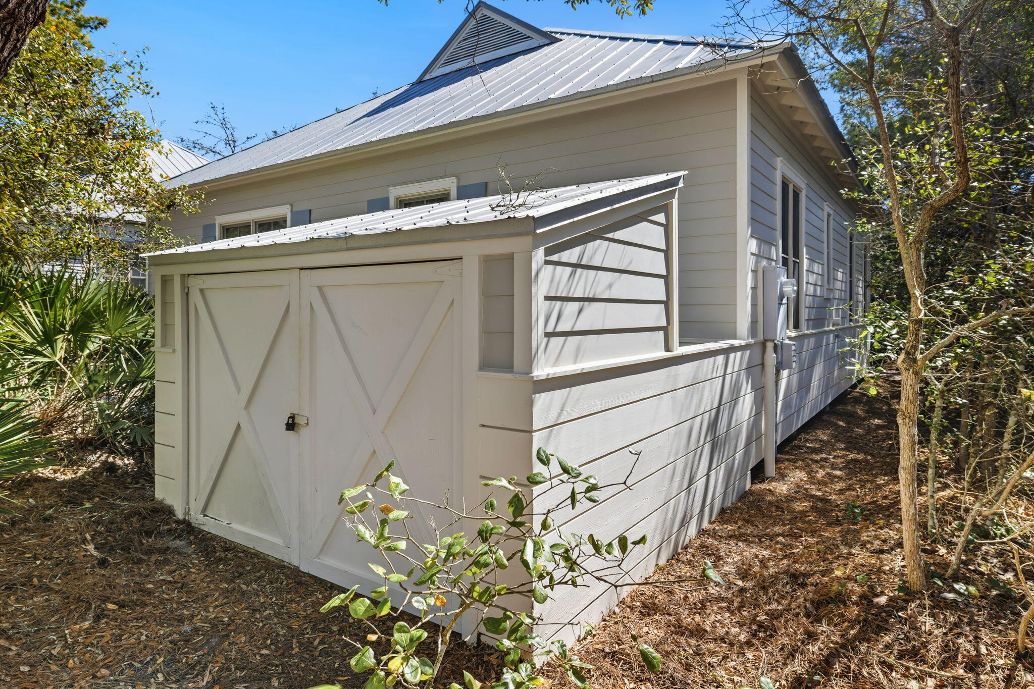 18 Kareny Lane Inlet Beach, FL 32461 - Photo 37 of 48 a house with trees in front of it