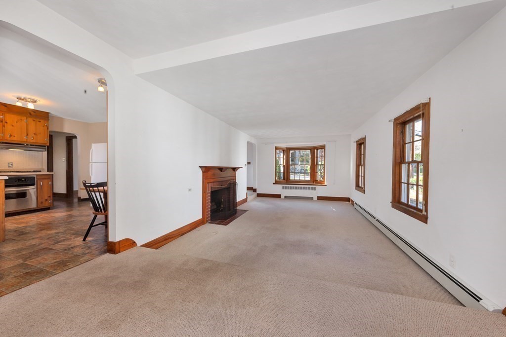 8 Tower Road Lexington, MA 02421 - Photo 11 of 39 a view of an empty room with a window