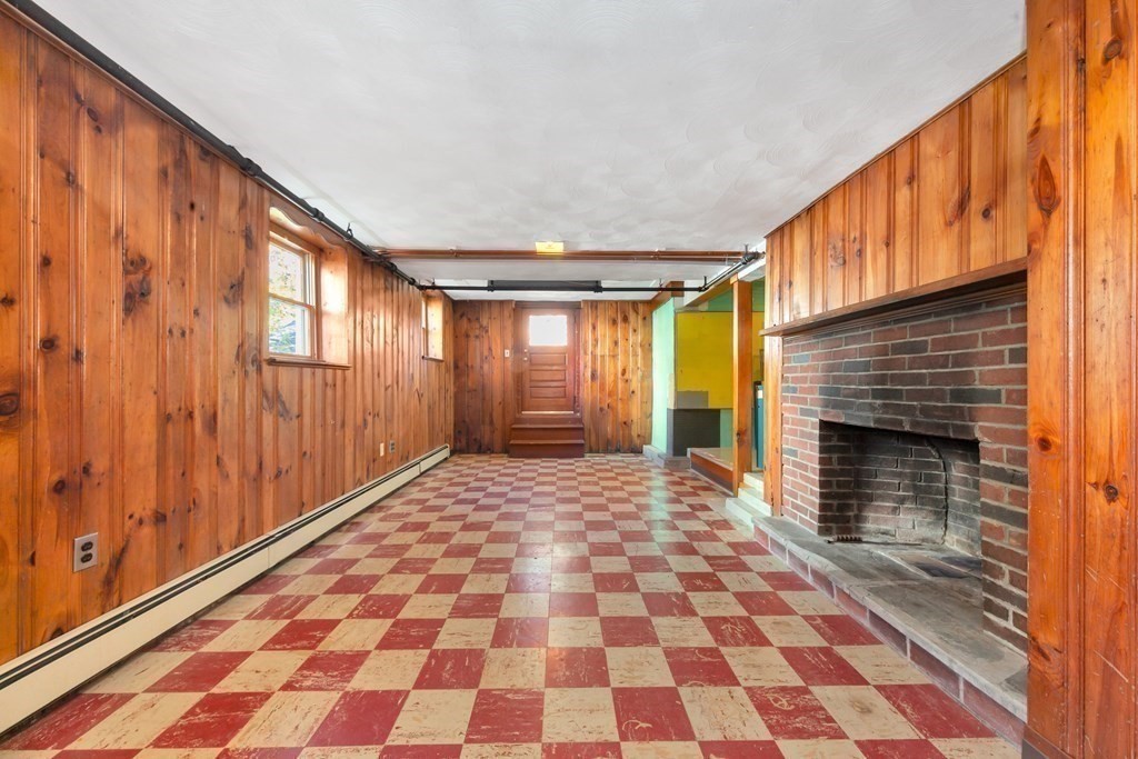 8 Tower Road Lexington, MA 02421 - Photo 28 of 39 a view of a living room with a black white checkered floor