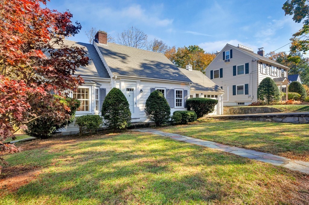 8 Tower Road Lexington, MA 02421 - Photo 3 of 39 a front view of a house with a yard
