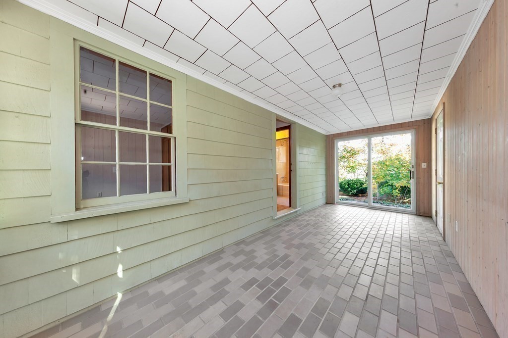 8 Tower Road Lexington, MA 02421 - Photo 31 of 39 a view of empty room with windows