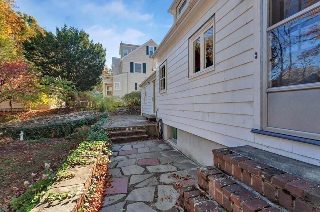 8 Tower Road Lexington, MA 02421 - Photo 34 of 39 a backyard of a house with lots of green space