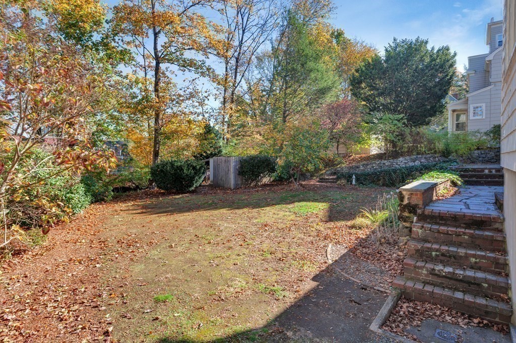 8 Tower Road Lexington, MA 02421 - Photo 35 of 39 a view of a lake with a yard