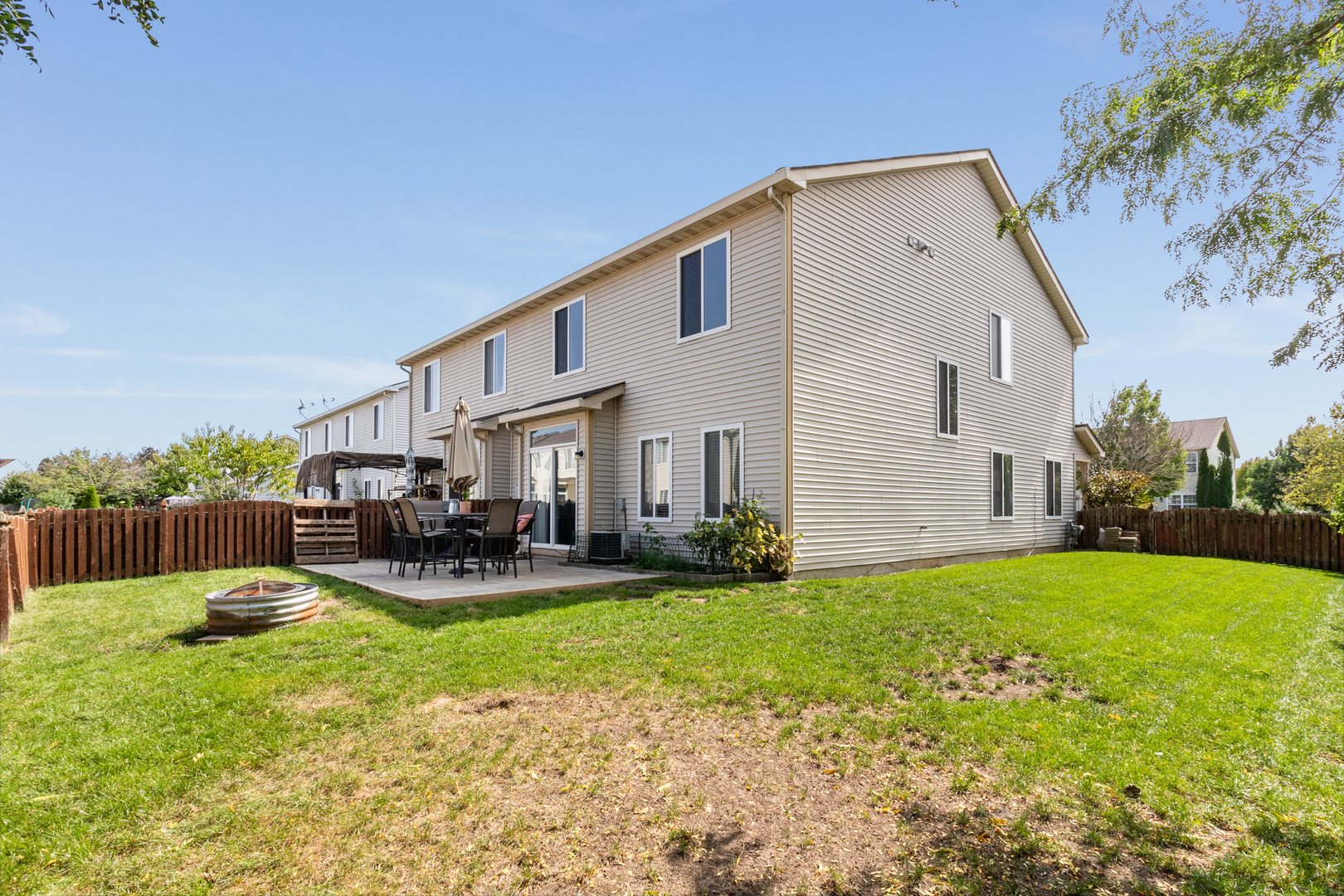 311 Reston Circle Romeoville, IL 60446 - Photo 3 of 20 a view of a house with patio and sitting area