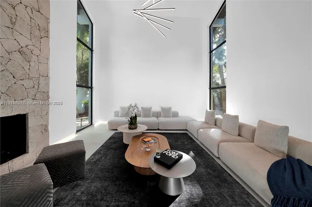 a bedroom with bed and a flat screen tv